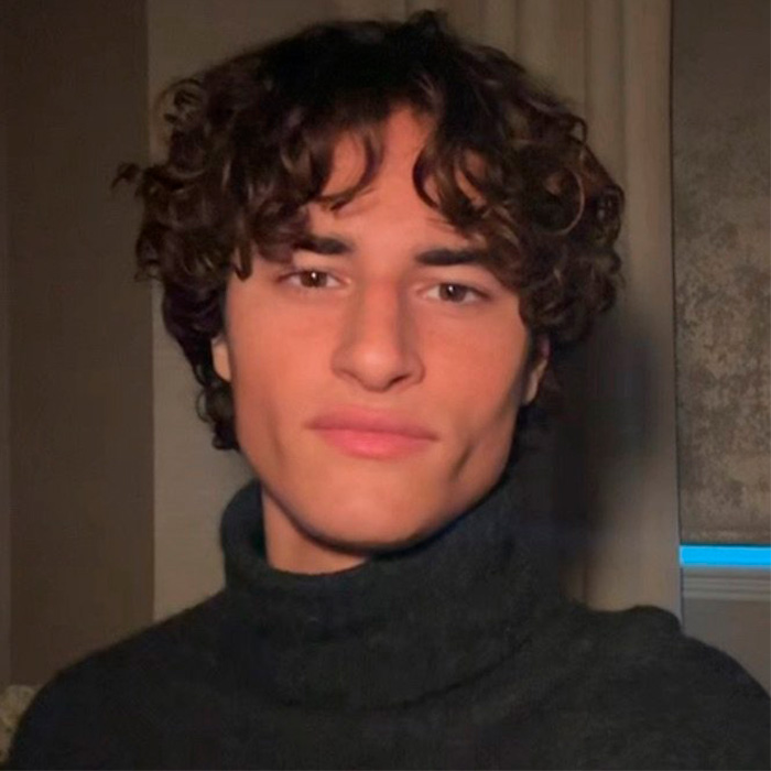 Portrait of a young man showcasing looksmaxxing results