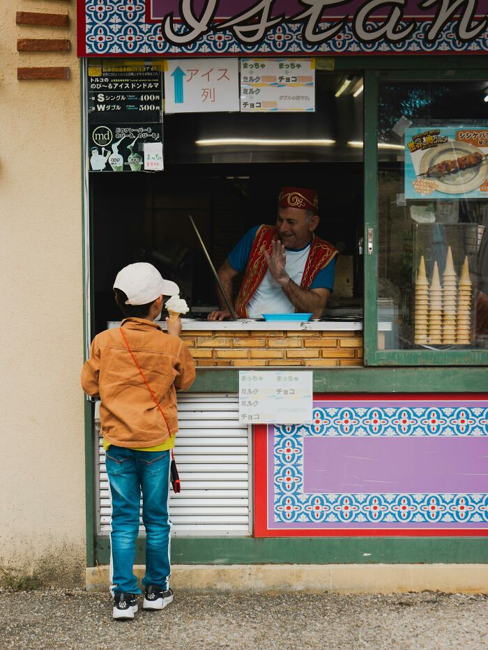 Child buying ice cream from man in traditional outfit weird confessions