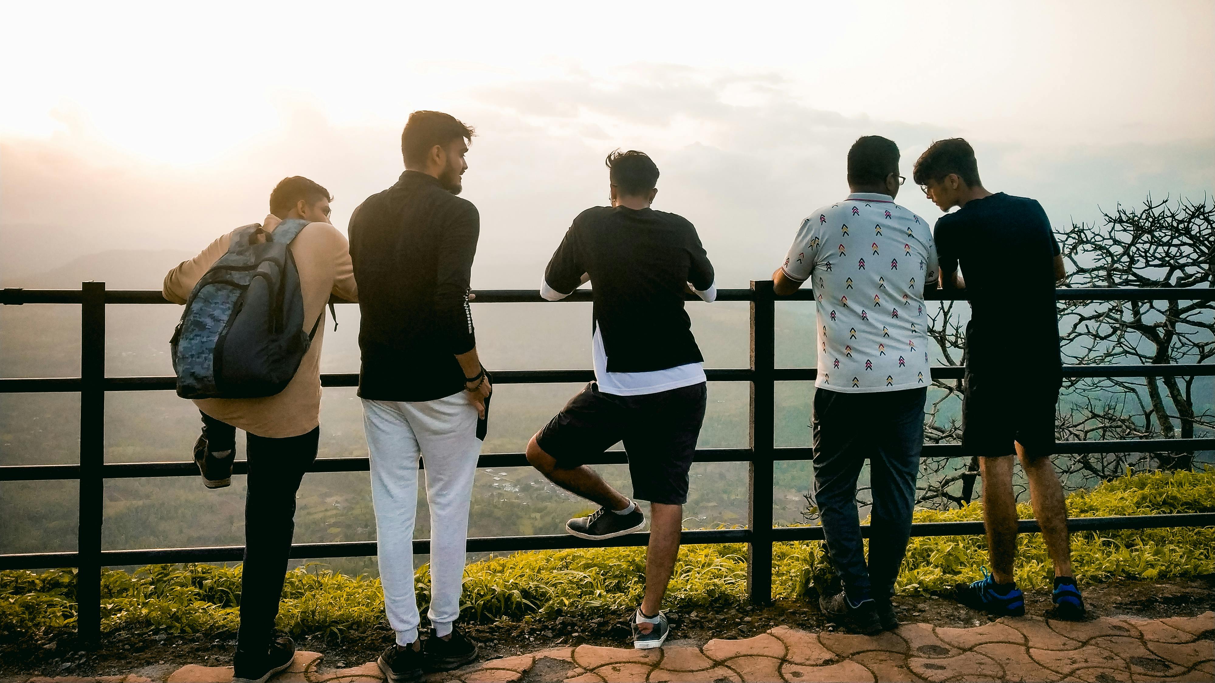 Group of men, illustrating husband's friends in the relationship issue