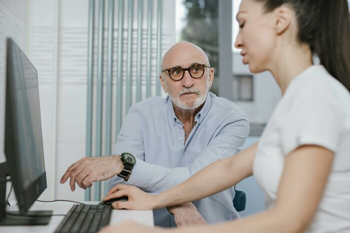 Therapist consulting older man about cult escape recovery
