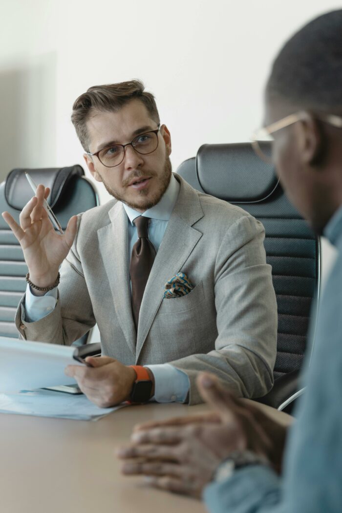 Businessman during job interview discussing employment issues Businessman during job interview discussing employment issues