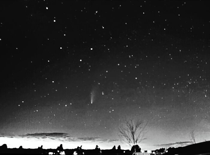 Night sky with stars and a comet in rare moments photo
