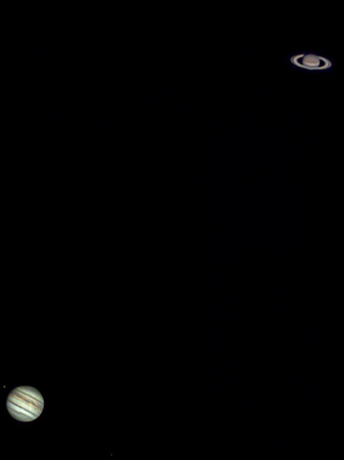 Rare moment capturing Jupiter and Saturn close together in the night sky