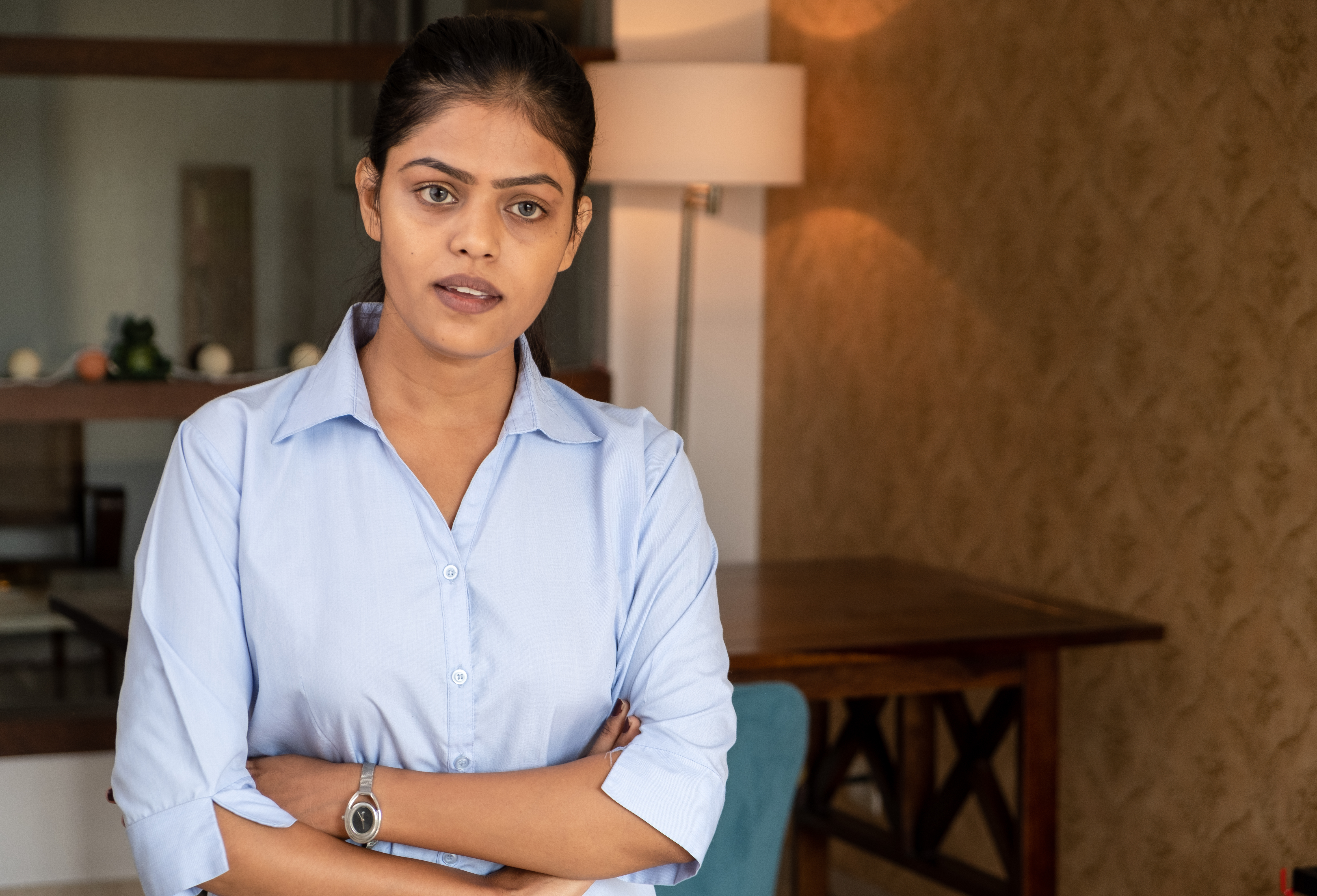 Woman looking concerned at home needing time to recover from boyfriend's cousin's entitlement Woman looking concerned at home needing time to recover from boyfriend's cousin's entitlement