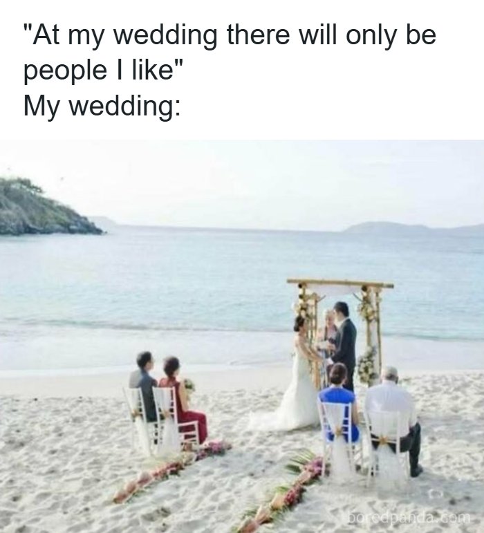 Small wedding ceremony on the beach with only a few guests attending