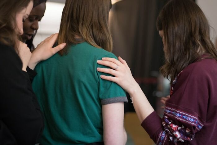 People offering support to someone in psychiatric facility