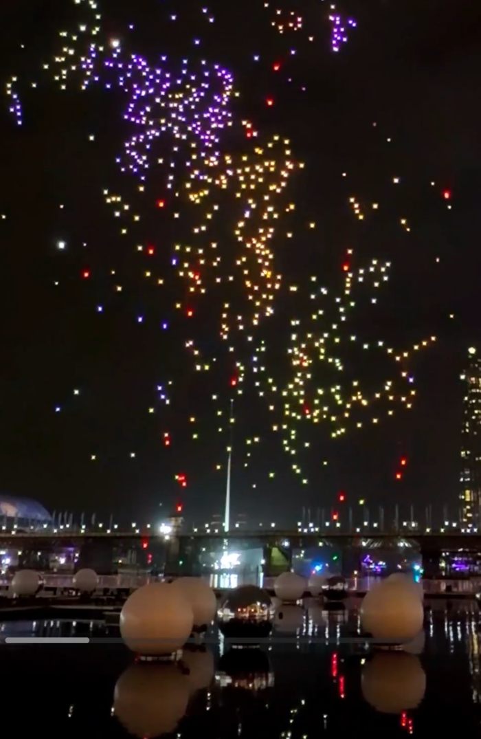 Sydney drone show with colorful lights over Sydney Harbour at night Sydney drone show with colorful lights over Sydney Harbour at night