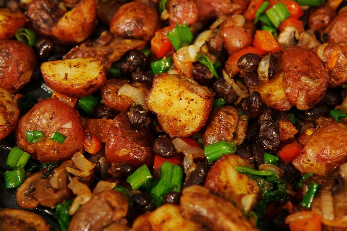 Roasted potatoes with vegetables and beans for poverty meals