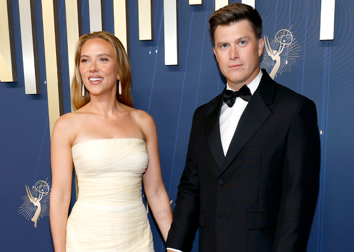 Scarlett Johansson and a man dressed formally at an event Scarlett Johansson and a man dressed formally at an event