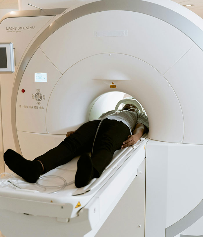 Person undergoing medical MRI scan procedure
