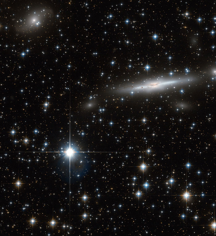 Starry sky with galaxy and bright star