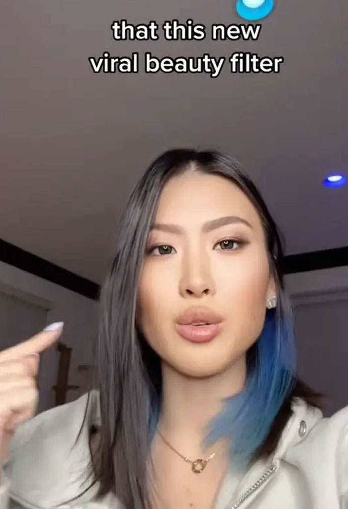 Young woman explaining viral beauty filter effects indoors beauty lies uncovered