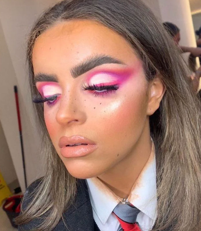 Woman with bold makeup exposing beauty industry lies