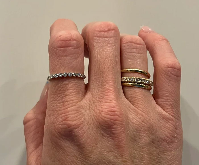 Wrinkled hands showing rings symbolizing aging beauty lies