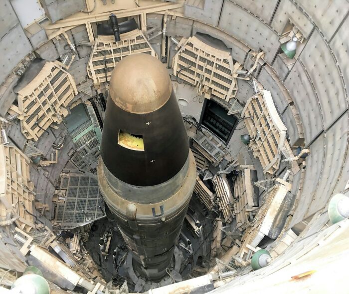 Nuclear missile in silo representing inevitable societal threats