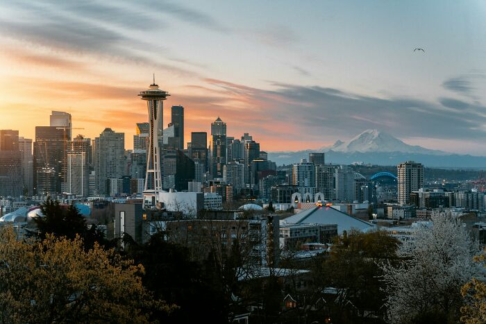 Seattle skyline at sunset highlighting fascinating city facts beyond the usual
