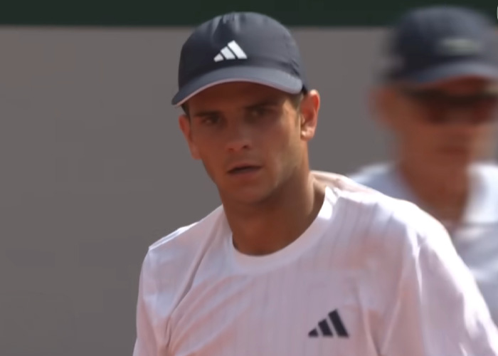French Open tennis star in Adidas outfit during match