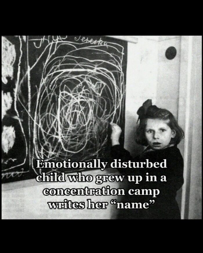 Emotionally disturbed child drawing on chalkboard in concentration camp, terrifying history facts