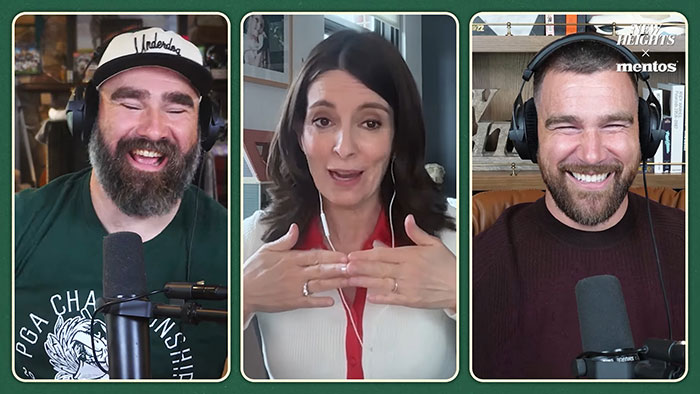 Tina Fey discussing manspreading in a virtual interview with two men