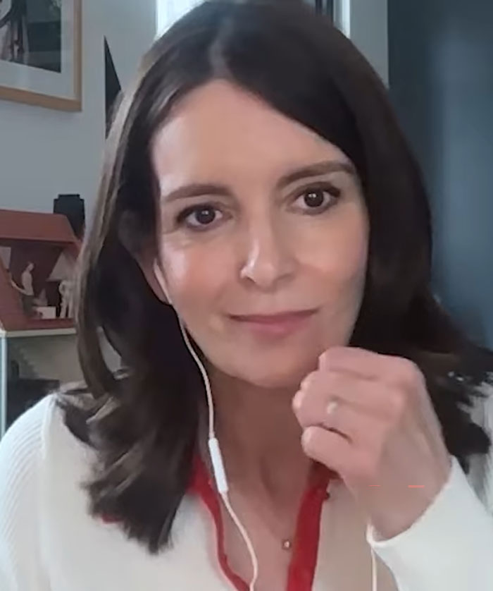 Close-up of Tina Fey speaking in an online interview about manspreading controversy