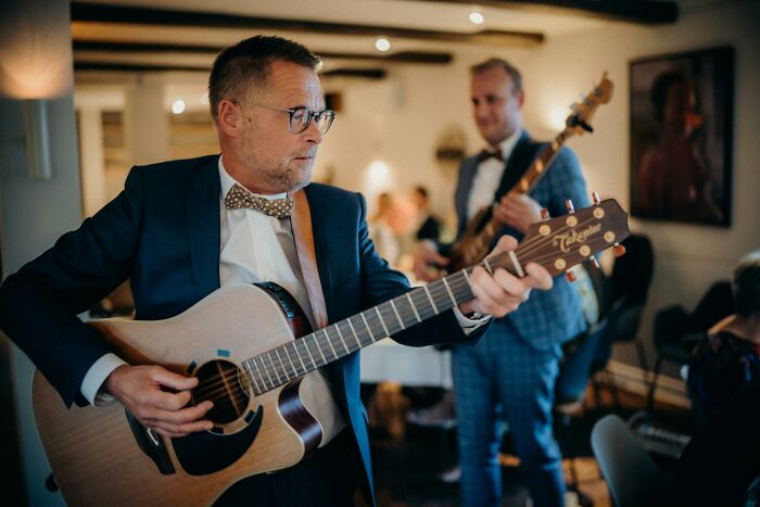 Guitar player performing live at wedding reception