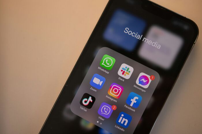 Social media apps on phone related to digital afterlife