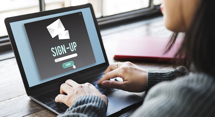 Watching sign-up process on laptop for digital afterlife