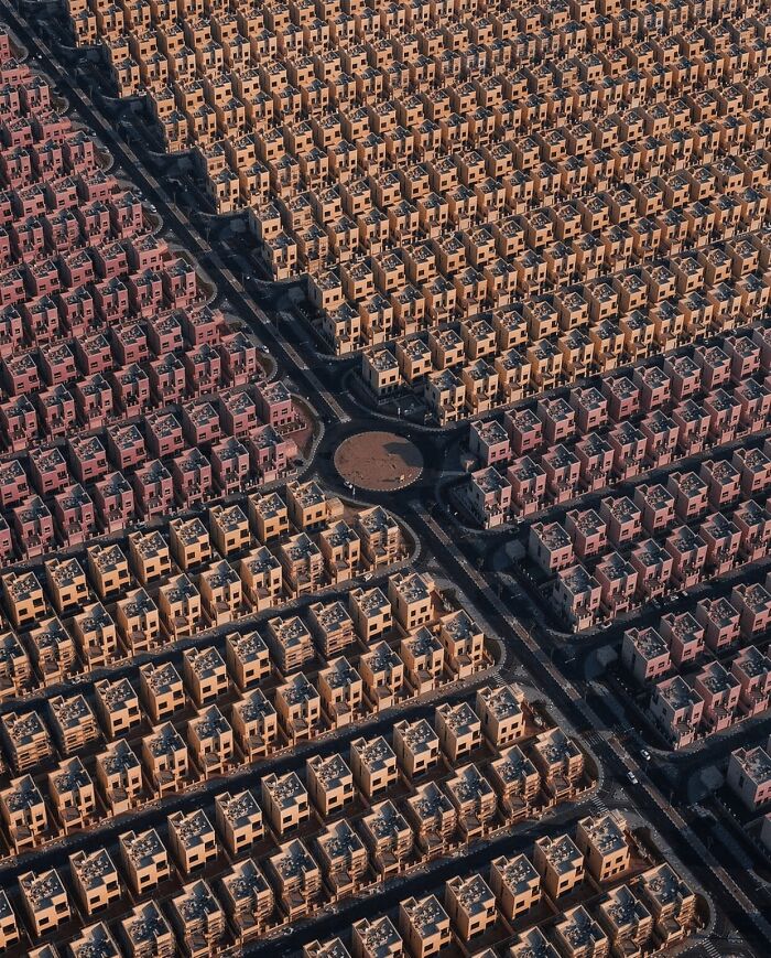 Aerial view of densely packed residential houses in a grid layout