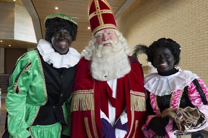 Traditional Dutch Sinterklaas celebration with blackface Zwarte Piet characters