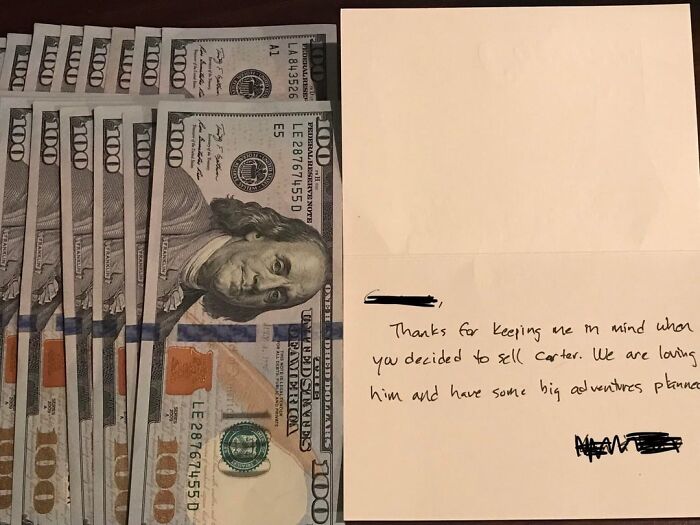 Hundred dollar bills beside a handwritten thank you note for selling a pet Carter