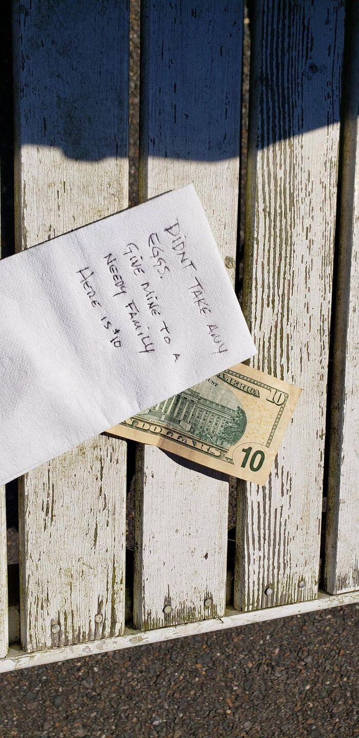 Note on napkin with money about eggs for needy family showing wholesome kindness