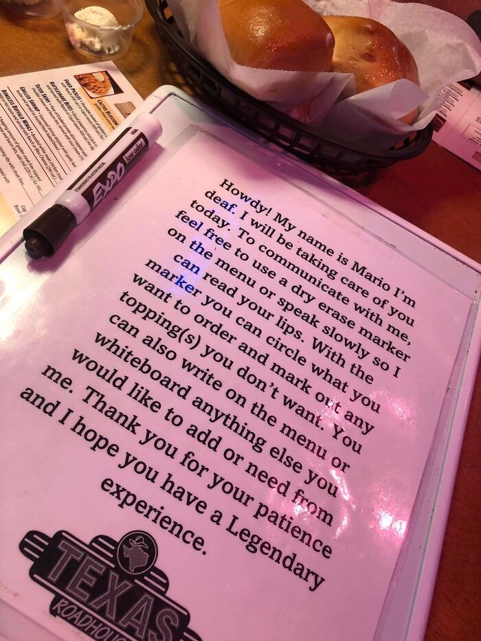 Restaurant note explaining communication with deaf server Mario