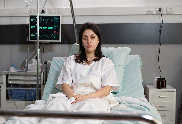 Bride in hospital bed showing health danger from toxic MIL allergen Bride in hospital bed showing health danger from toxic MIL allergen