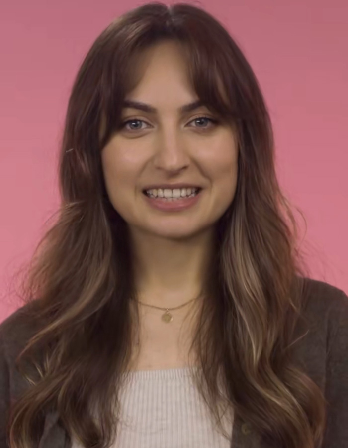 Smiling woman featured in extreme human experiment study with pink background