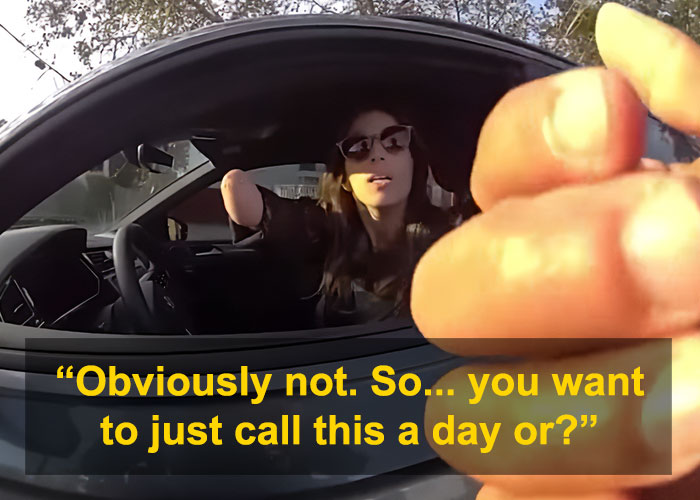Woman with no right hand responding to police officer during traffic stop Woman with no right hand responding to police officer during traffic stop
