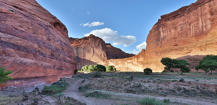 Scenic view of rugged red rock canyons under blue sky in the US