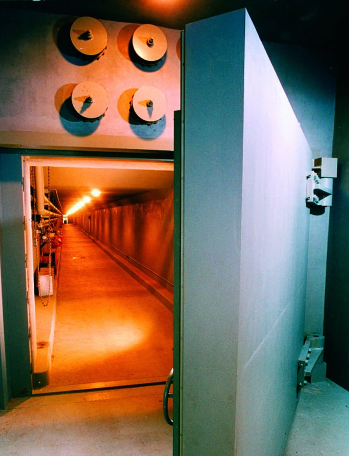 The Greenbrier Bunker. Heavy protective door opens to a long hallway inside secret underground bunker