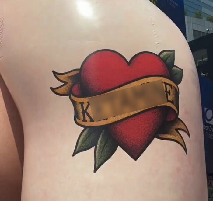 Heart tattoo detail on Elon Musk inflatable in Times Square