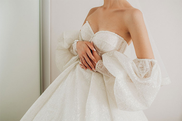 A beautiful bride in a wedding dress, highlighting the sentimental value of a dress. A beautiful bride in a wedding dress, highlighting the sentimental value of a dress.