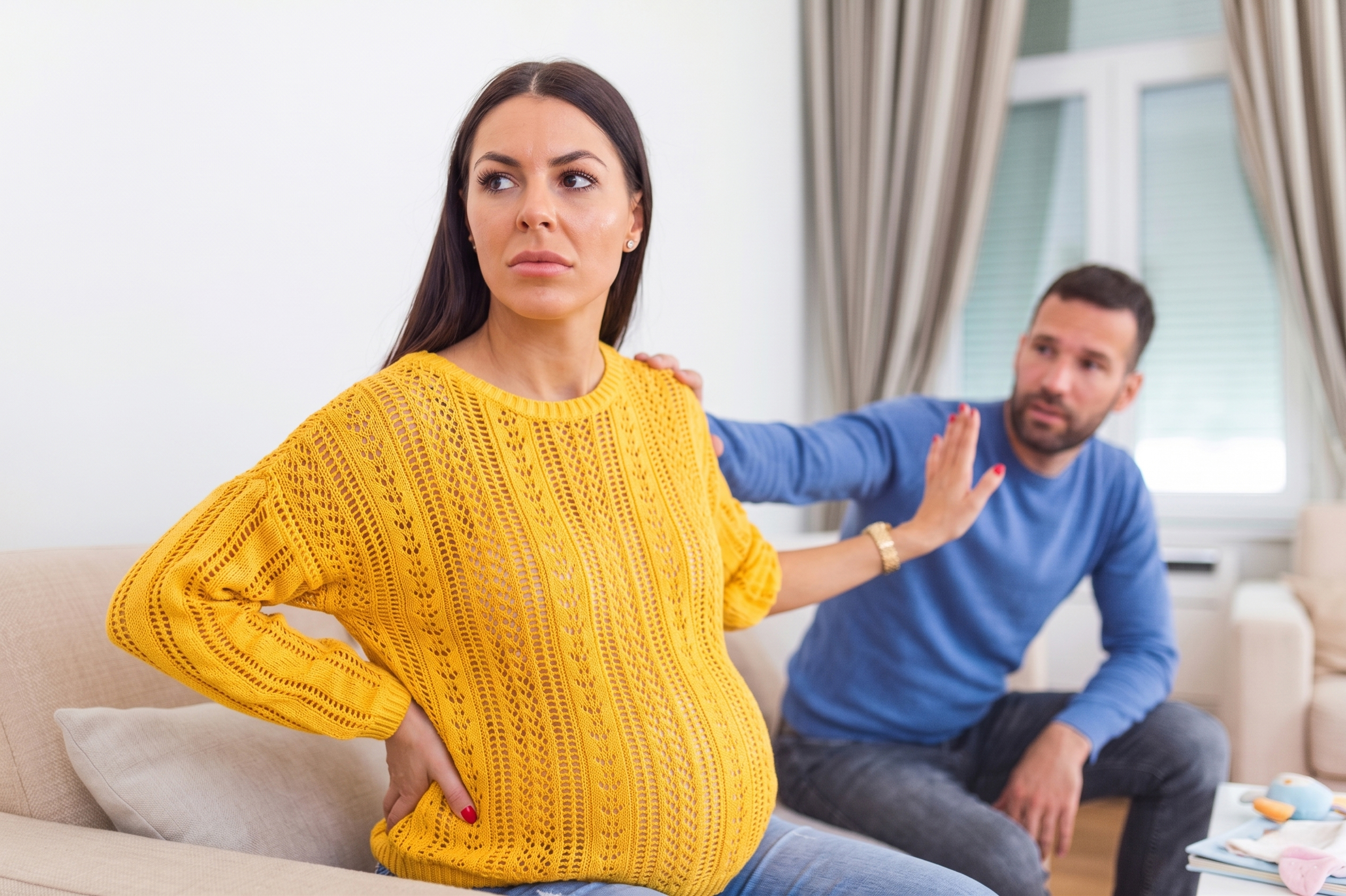 A pregnant wife pushes away her husband as she experiences pain, highlighting the challenges of pregnancy and relationships.