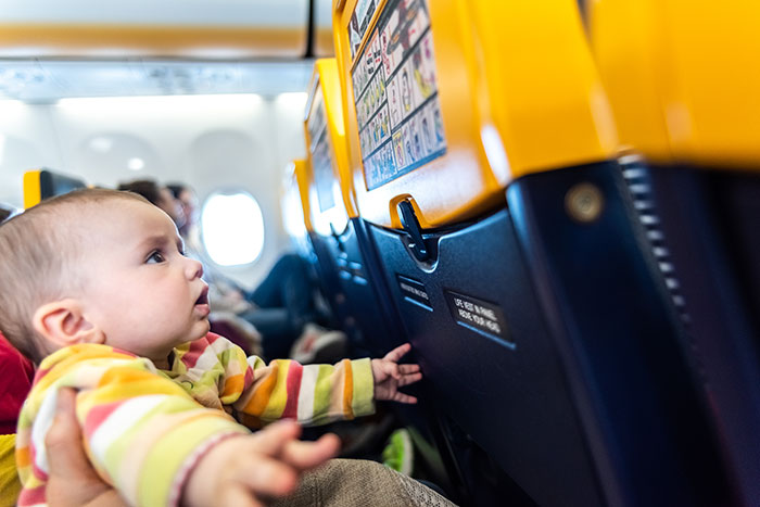 Entitled Mother Tries To Force Toddler Out Of Paid Seat, And The Flight Attendant's Move Is Pure Satisfaction