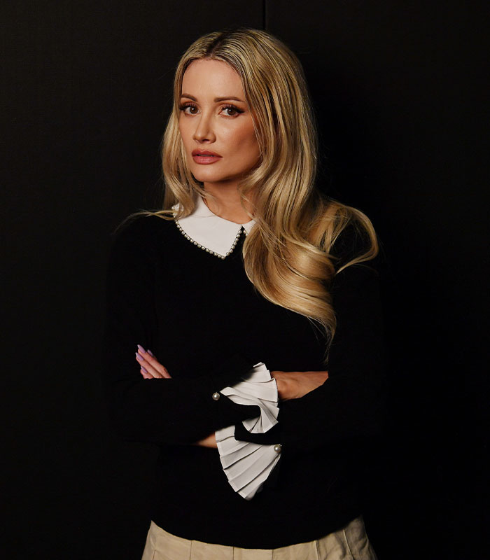 Holly Madison portrait in black sweater revealing life behind the mansion gates Holly Madison portrait in black sweater revealing life behind the mansion gates
