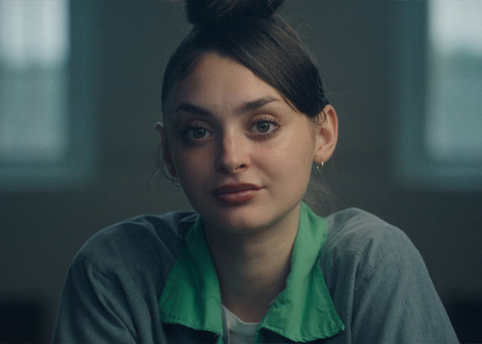 Portrait of Mackenzie Shirilla with hair in a bun and green jacket Portrait of Mackenzie Shirilla with hair in a bun and green jacket