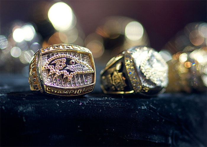 Two championship rings, representing the peak of a popular kid's high school achievements.