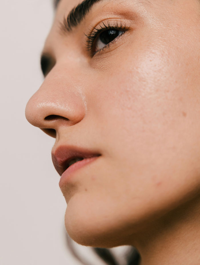 Close-up of a woman's face showing natural skin and facial features