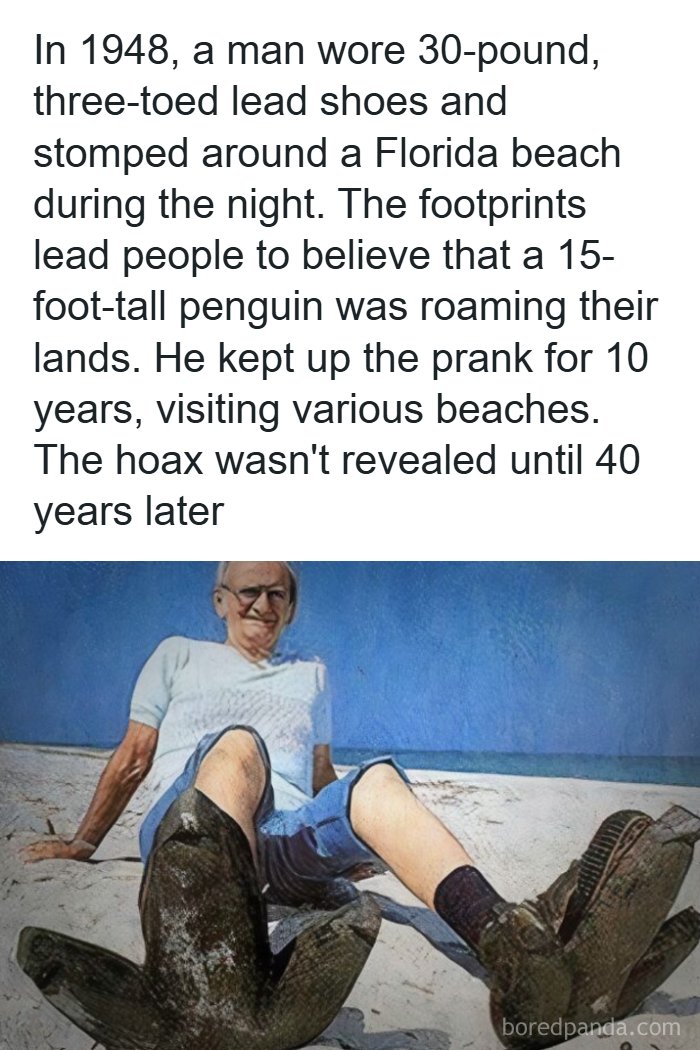 A man sitting on a beach with enormous, three-toed lead shoes that helped him fool people into thinking a penguin was loose, a real Mad Lad.
