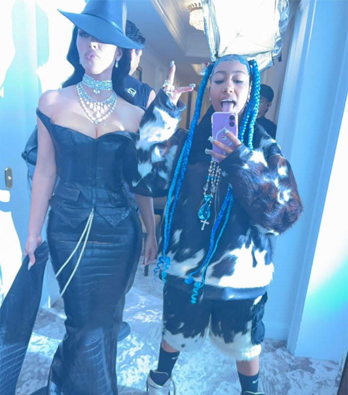 Beyonc&eacute; and Kim Kardashian's parenting styles displayed with North West with blue braids and a woman in a black dress.