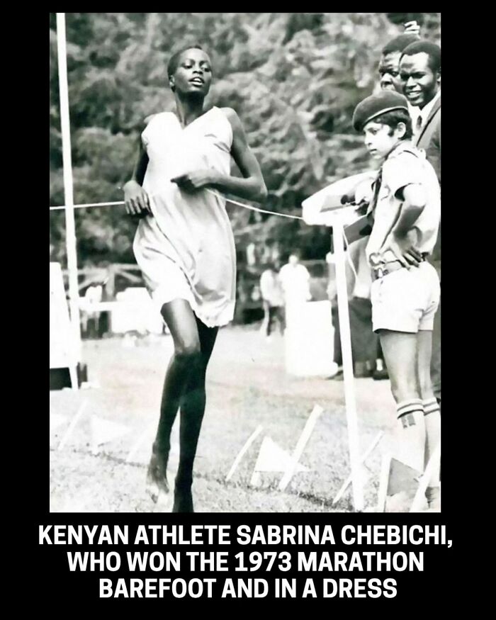 A black and white historical photo of Kenyan athlete Sabrina Chebichi winning the 1973 marathon barefoot in a dress.
