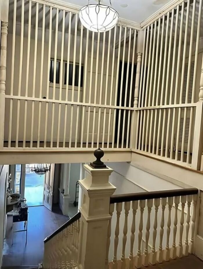 Staircase railing design with obstructive vertical bars and poor planning fail