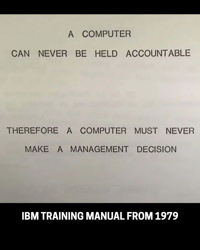 A historical photo showing an IBM training manual from 1979, discussing computer accountability.